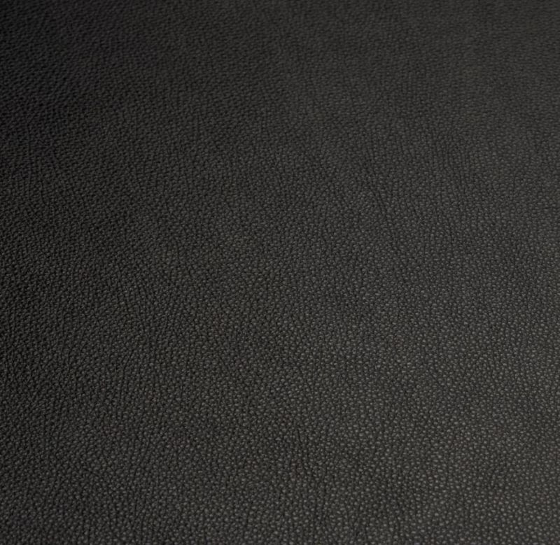 Detailaufnahme der graphitschwarzen Lederauflage für USM Beistelltisch, hochwertiges Leder "Leather on Top".